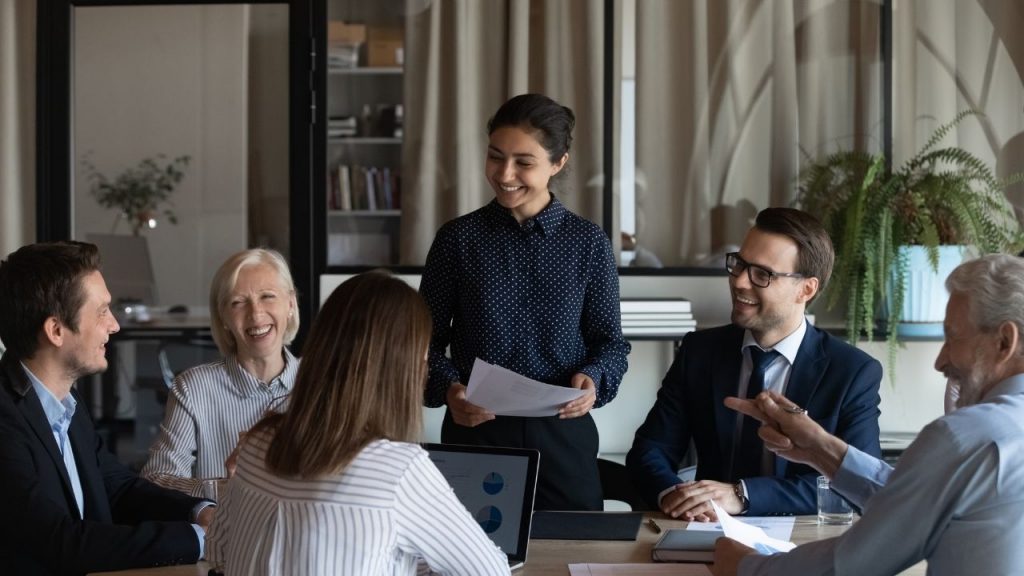 happy employees after team coaching