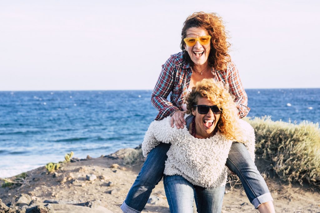 Happy and cheerful middle age couple of caucasian women